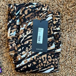 K-DEER Leopard print Safari legging. Brand new and never worn. Size small.